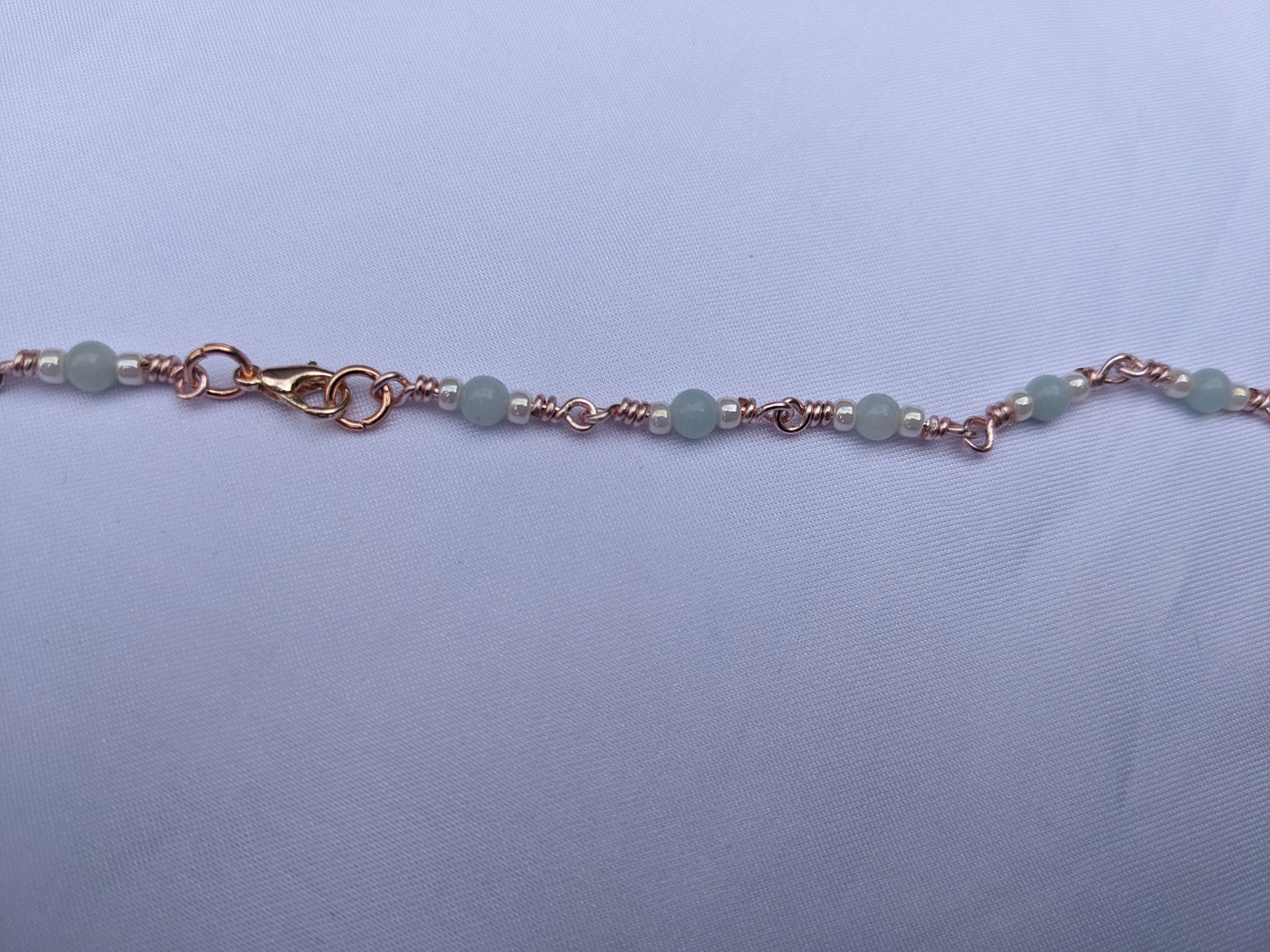 Handmade rose gold coloured chain with Amazonite and glass beads