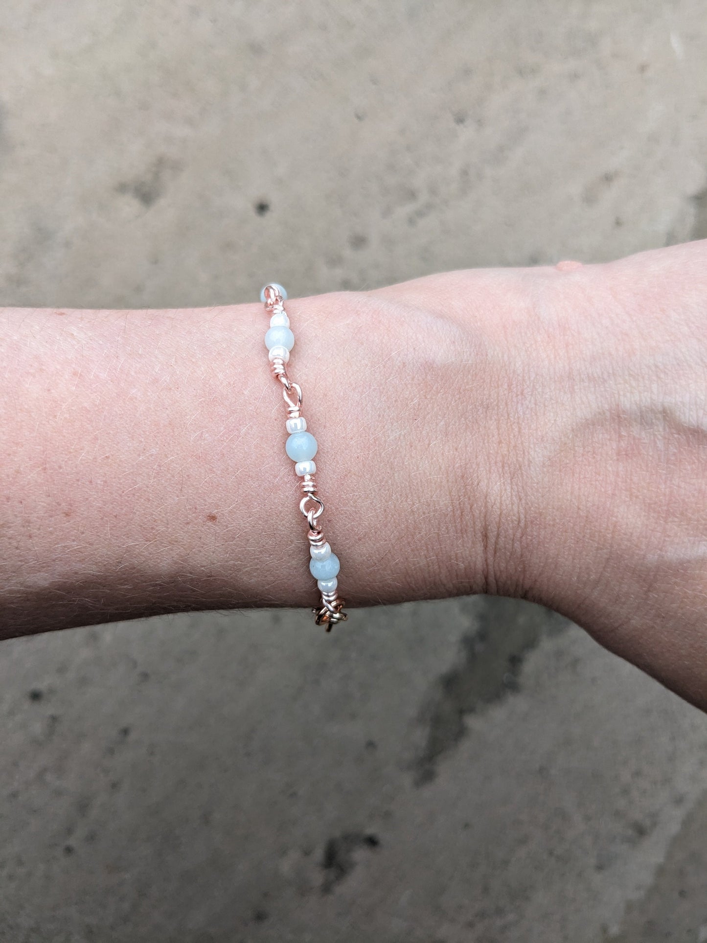 Handmade rose gold coloured chain with Amazonite and glass beads