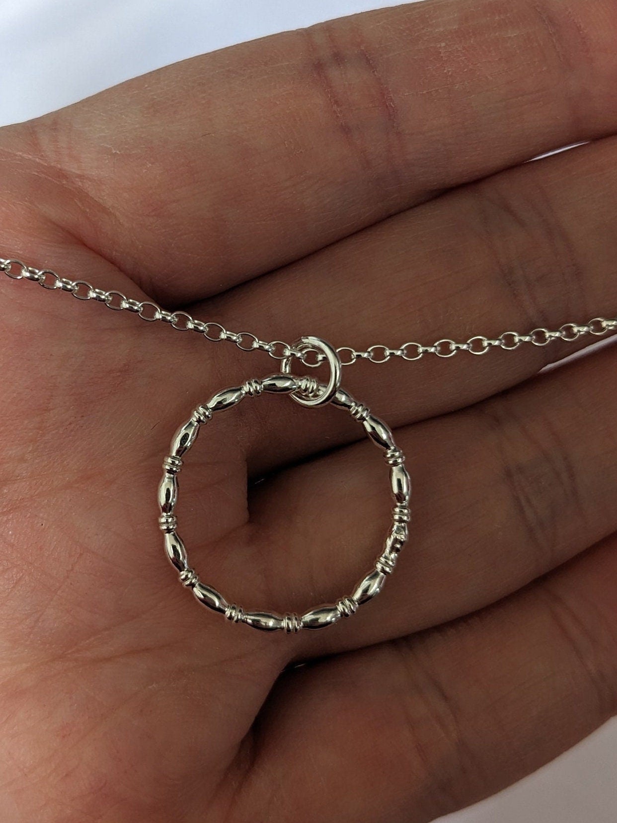 Sterling silver patterned geometric circle tactile necklace, handmade sterling silver pendant