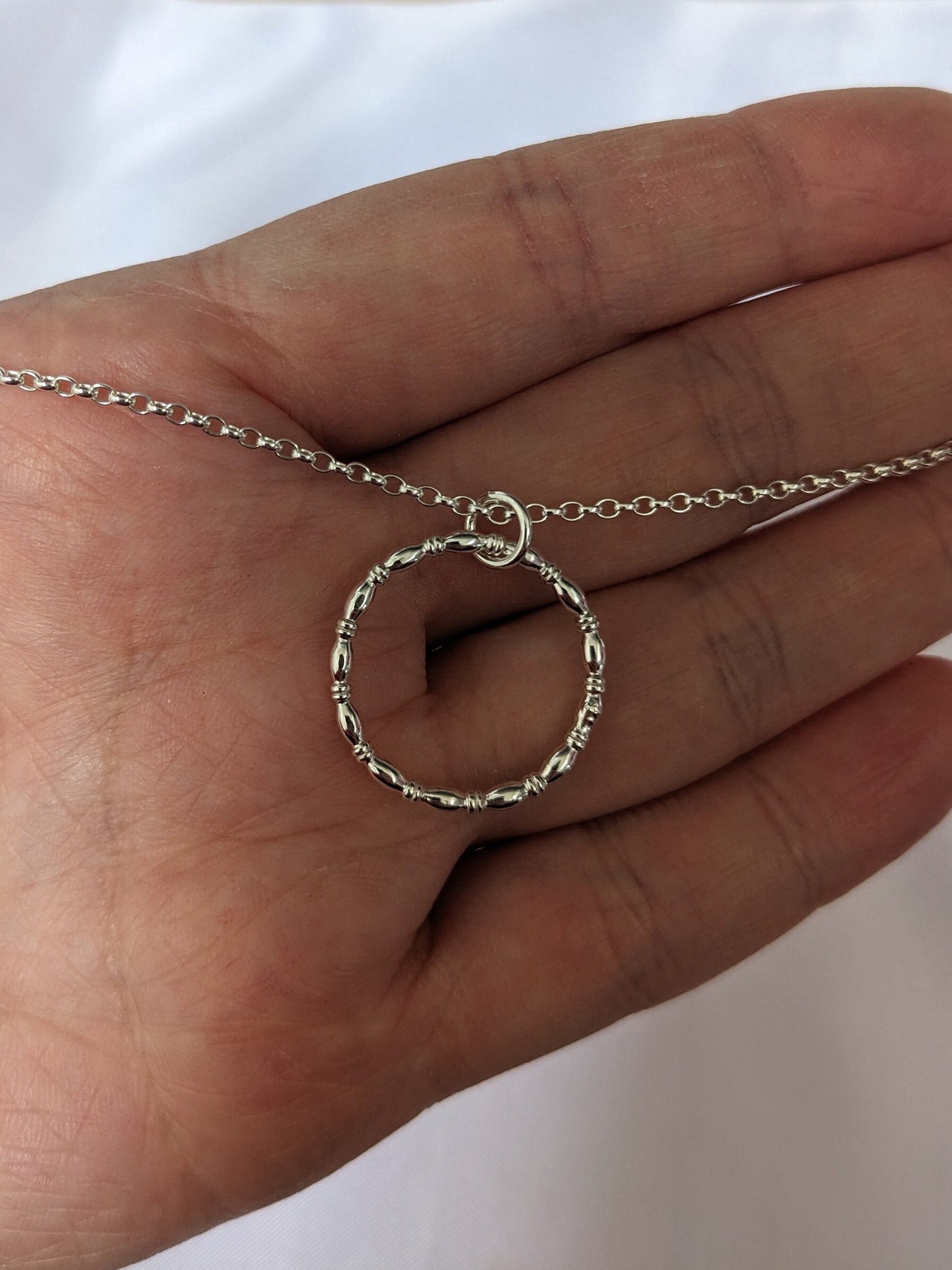 Sterling silver patterned geometric circle tactile necklace, handmade sterling silver pendant