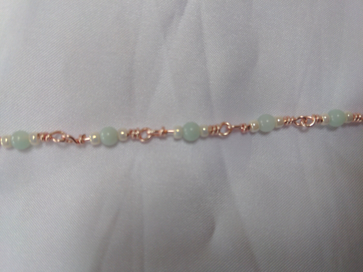 Handmade rose gold coloured chain with Amazonite and glass beads