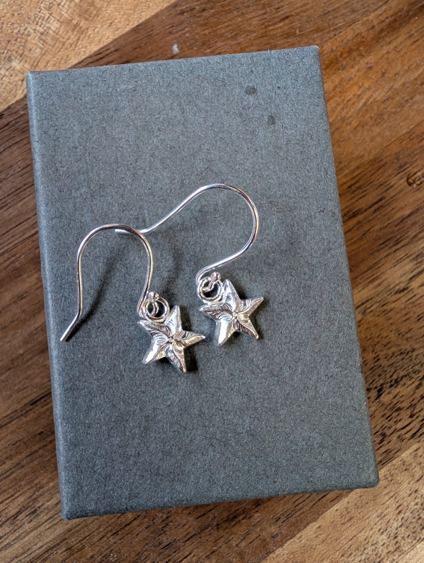 Sterling Silver Dainty Starfish Earrings | Cute recycled silver starfish dangle earrings