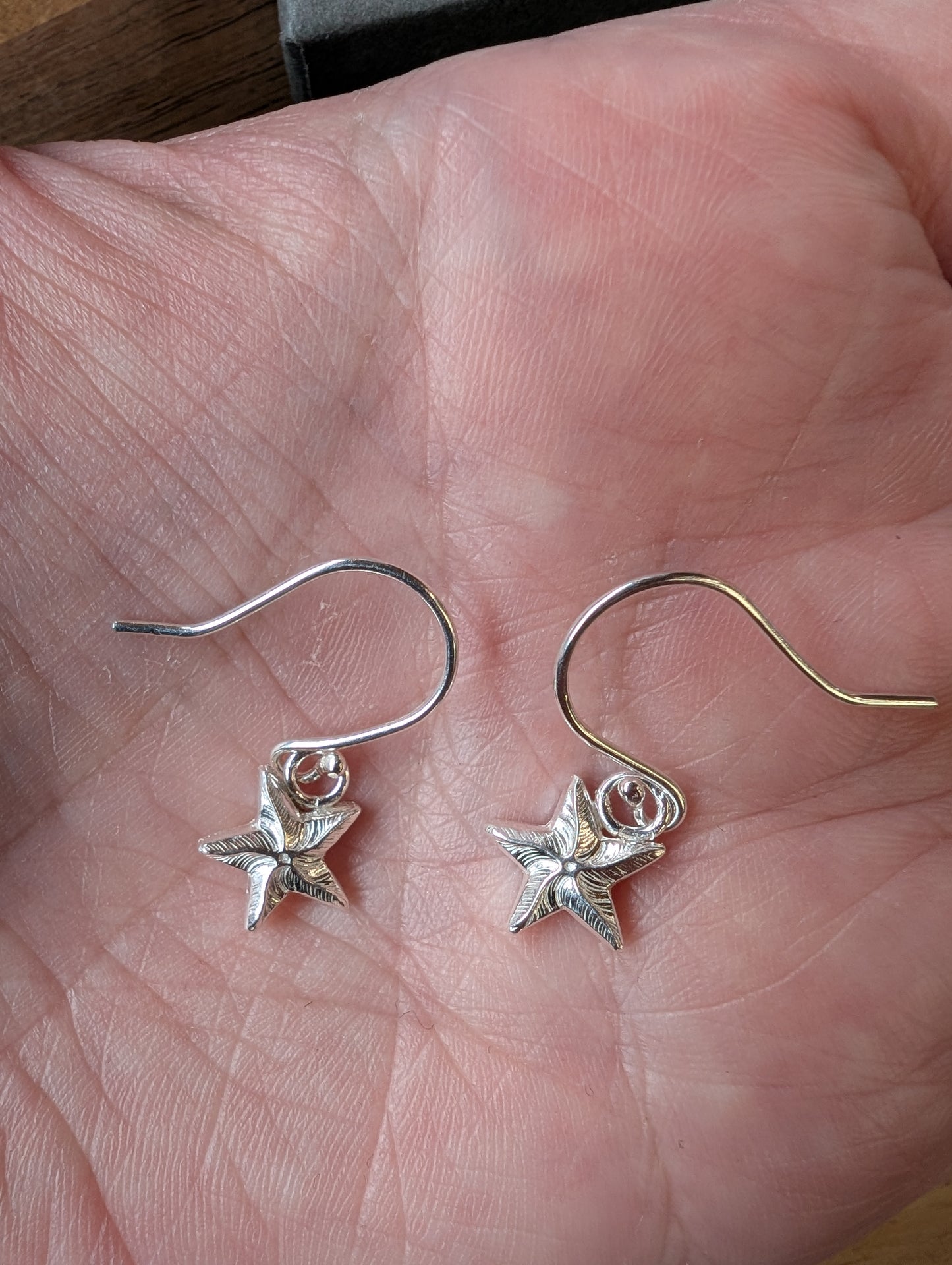 Sterling Silver Dainty Starfish Earrings | Cute recycled silver starfish dangle earrings