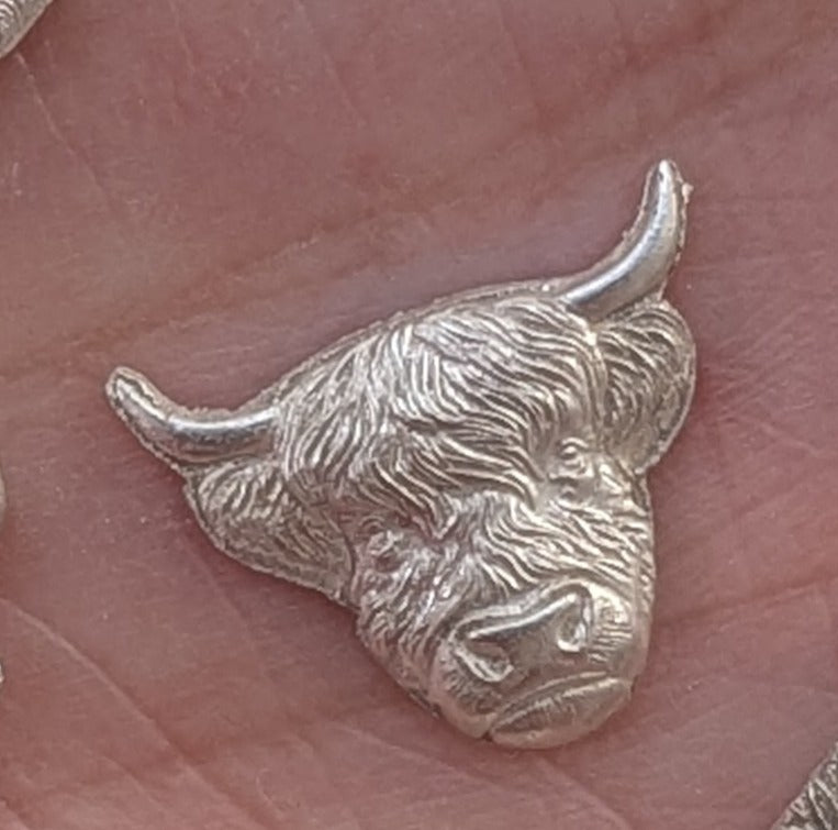 Highland Cow Charm Earrings handmade from fine silver on a small sterling silver hoop or hook