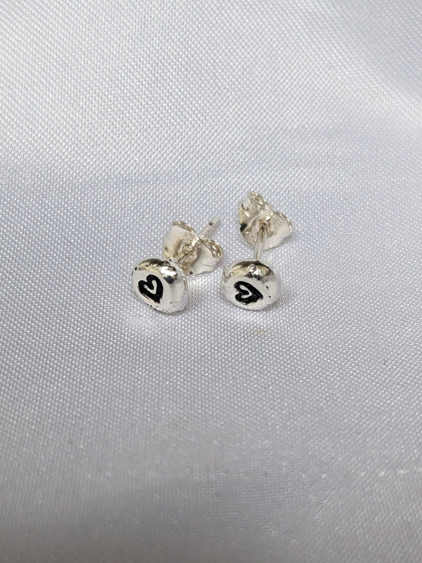 Sterling Silver Heart stud earrings | Handmade, hand stamped, small pebble studs