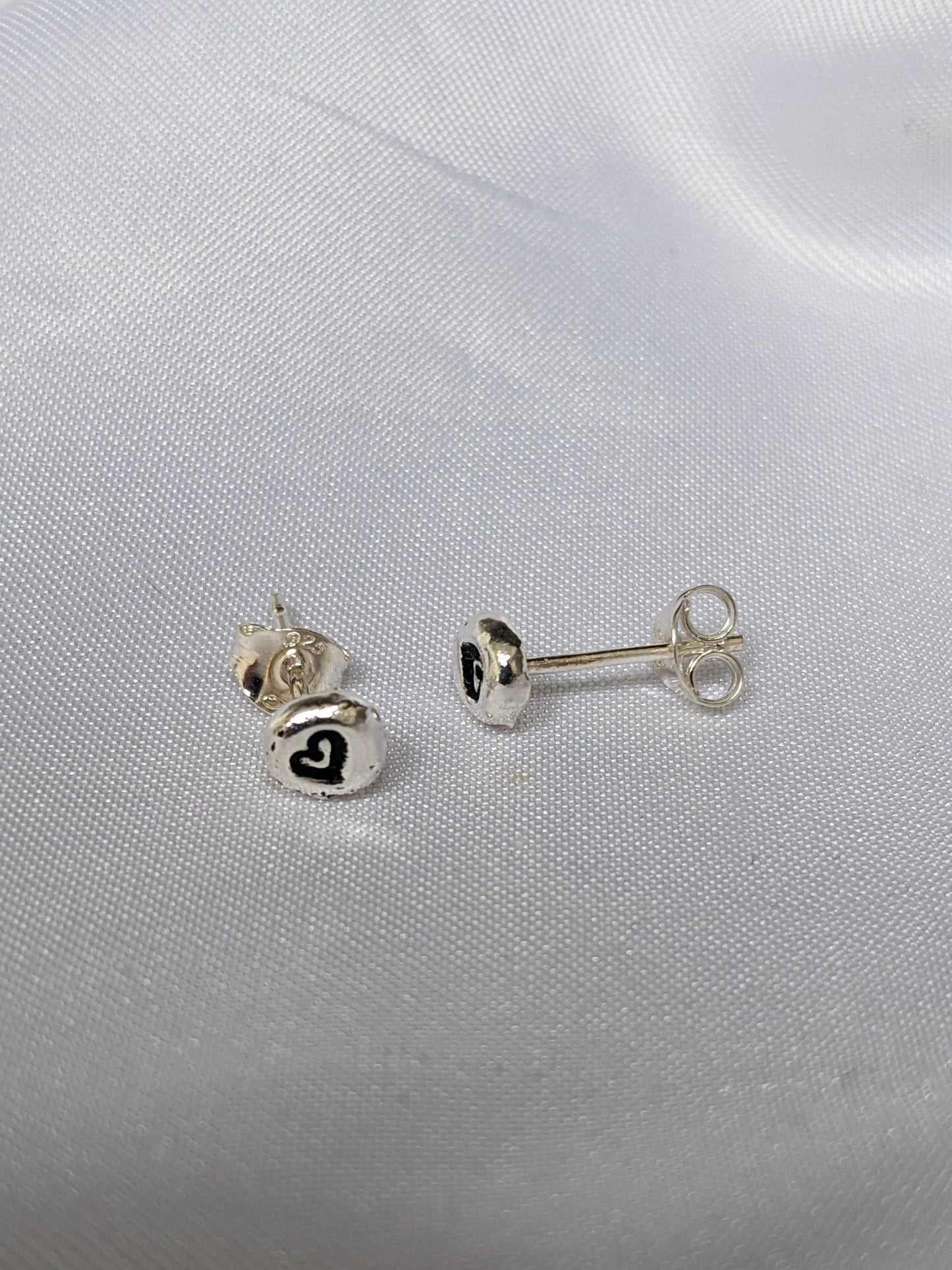 Sterling Silver Heart stud earrings | Handmade, hand stamped, small pebble studs