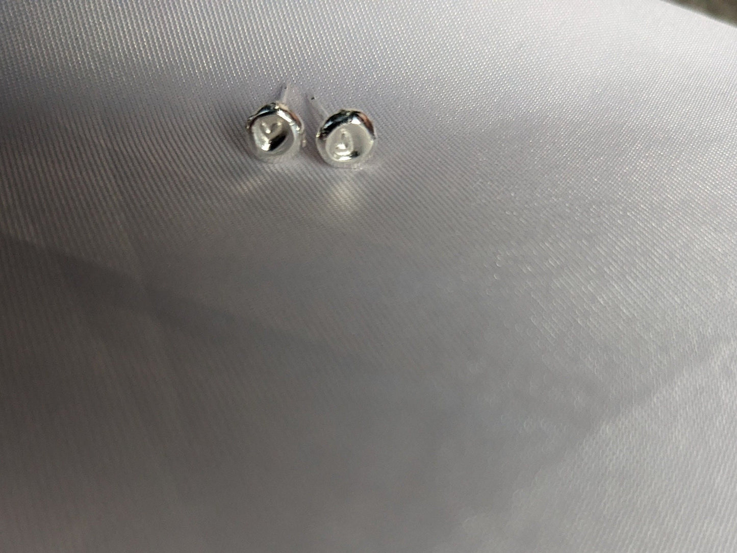 Sterling Silver Heart stud earrings | Handmade, hand stamped, small pebble studs