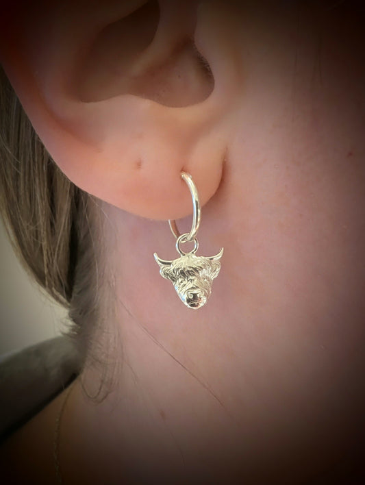 Highland Cow Charm Earrings handmade from fine silver on a small sterling silver hoop or hook