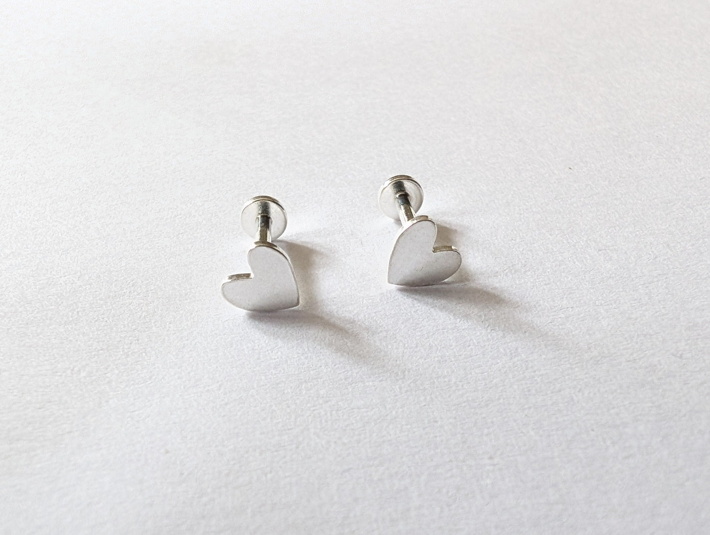 Pair of sterling silver heart labret stud earrings
