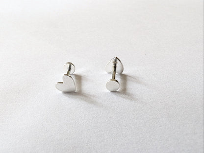 Front and back of sterling silver heart labret earrings