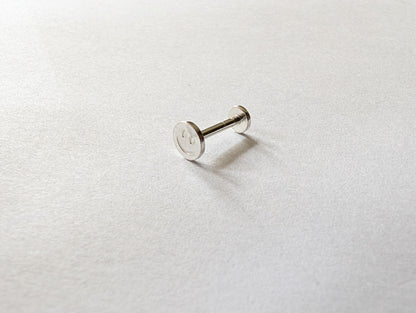Sterling silver labret earring with smiley face detail
