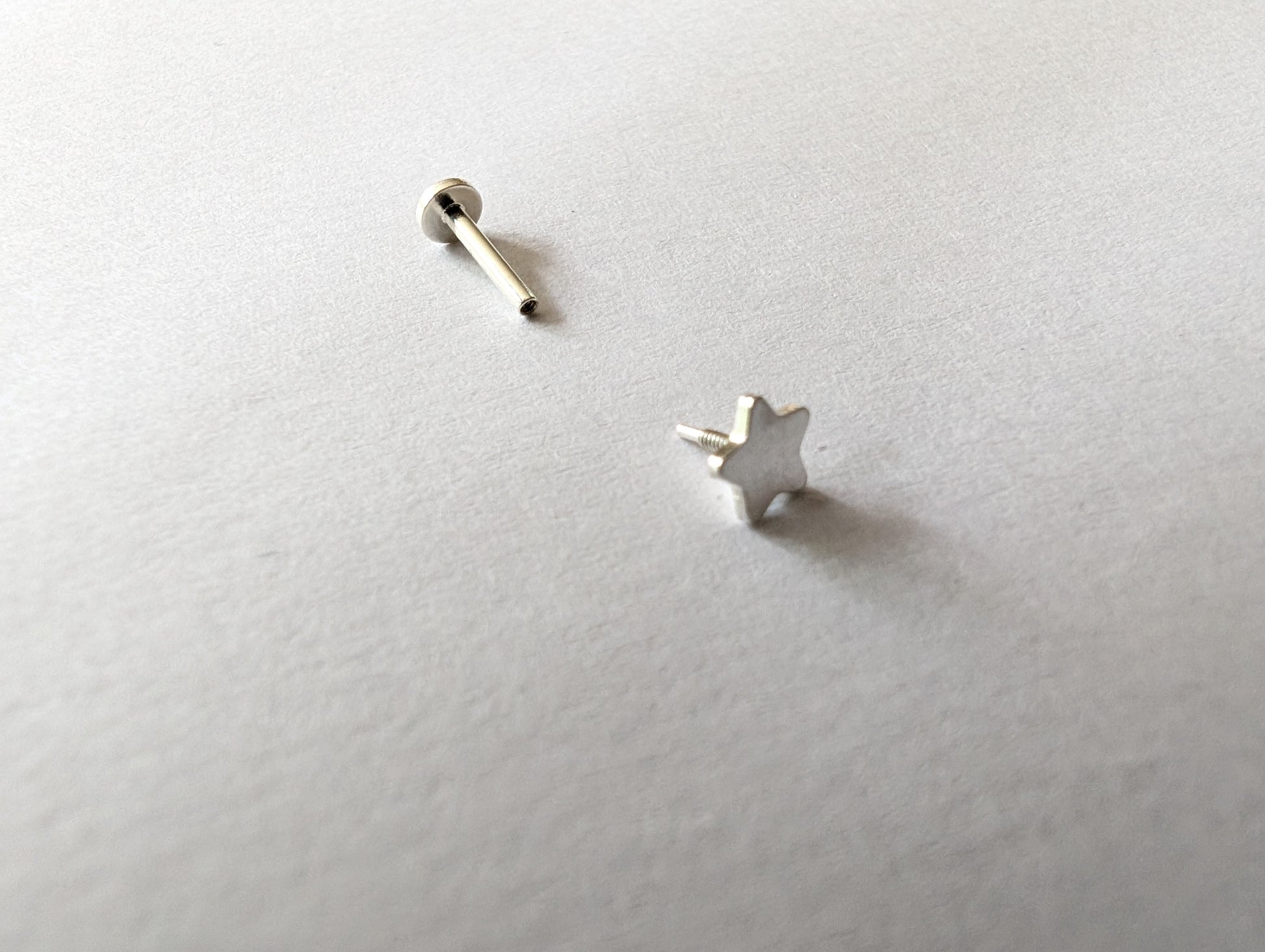 Sterling silver 4mm star flat back labret earring