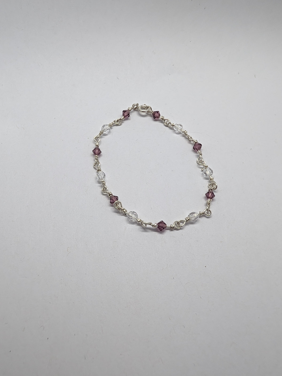 Sterling Silver Bracelet with Amethyst colour crystals