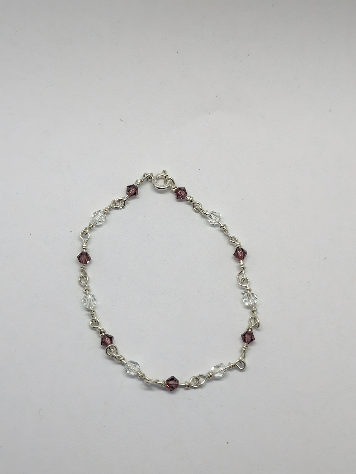 Sterling Silver Bracelet with Amethyst colour crystals