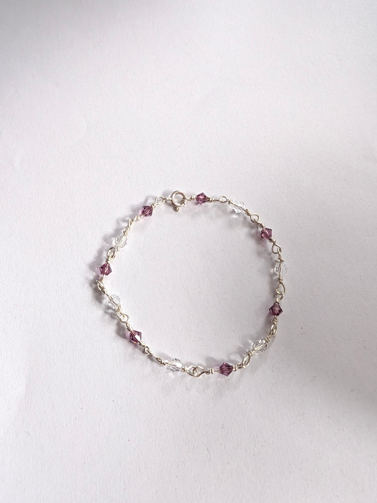 Sterling Silver Bracelet with Amethyst colour crystals