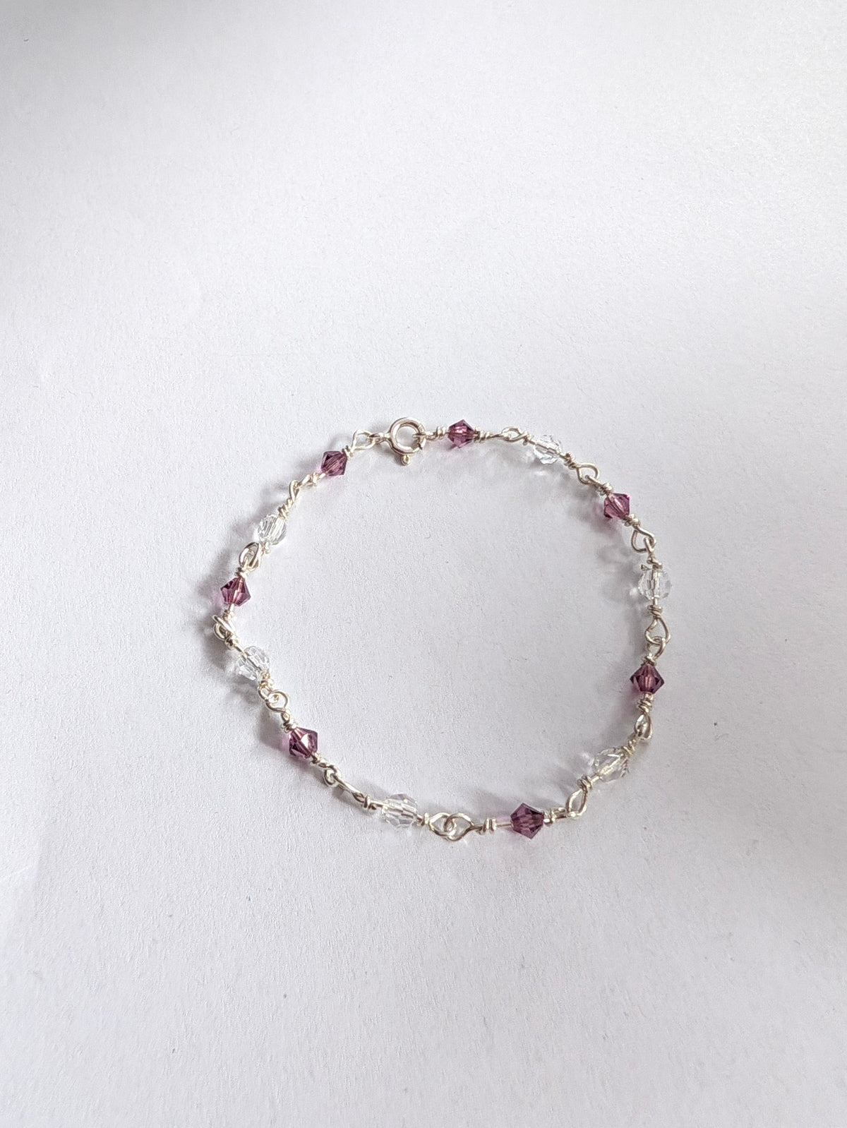 Sterling Silver Bracelet with Amethyst colour crystals