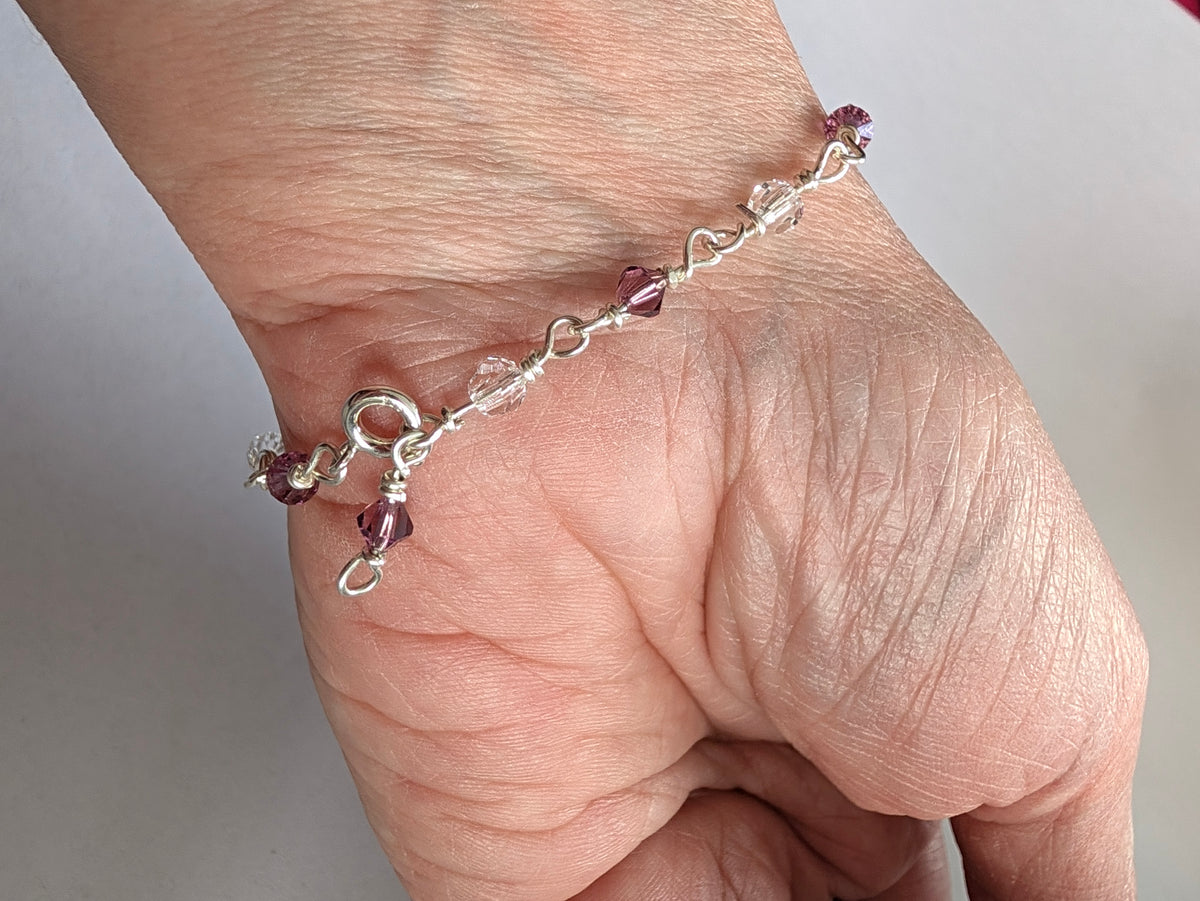 Sterling Silver Bracelet with Amethyst colour crystals