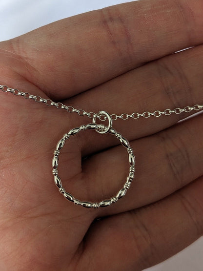 Sterling silver patterned geometric circle tactile necklace, handmade sterling silver pendant