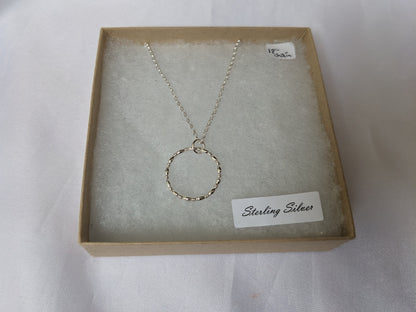 Sterling silver patterned geometric circle tactile necklace, handmade sterling silver pendant