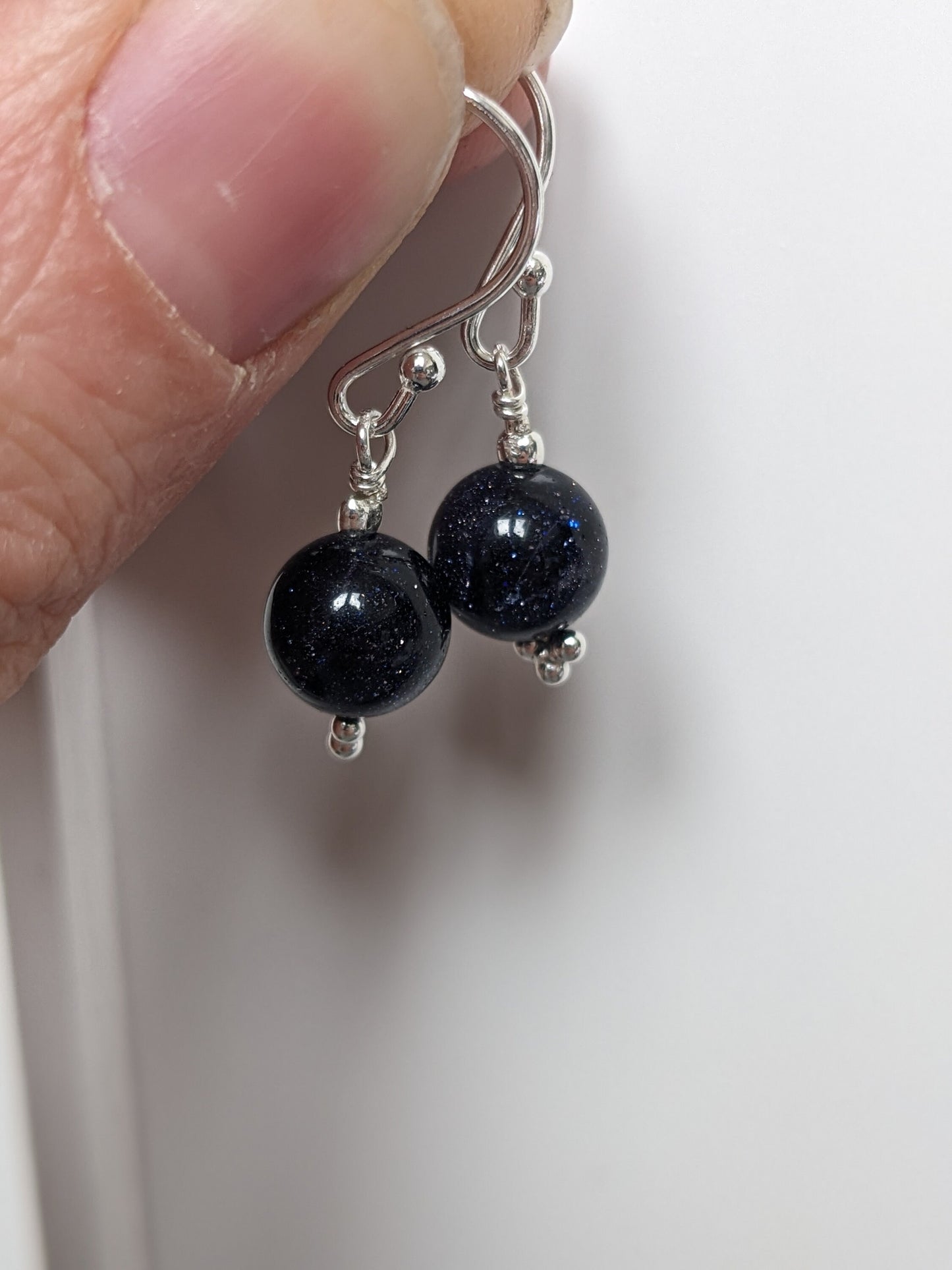 Sterling Silver Earrings with a sparkle blue goldstone bead