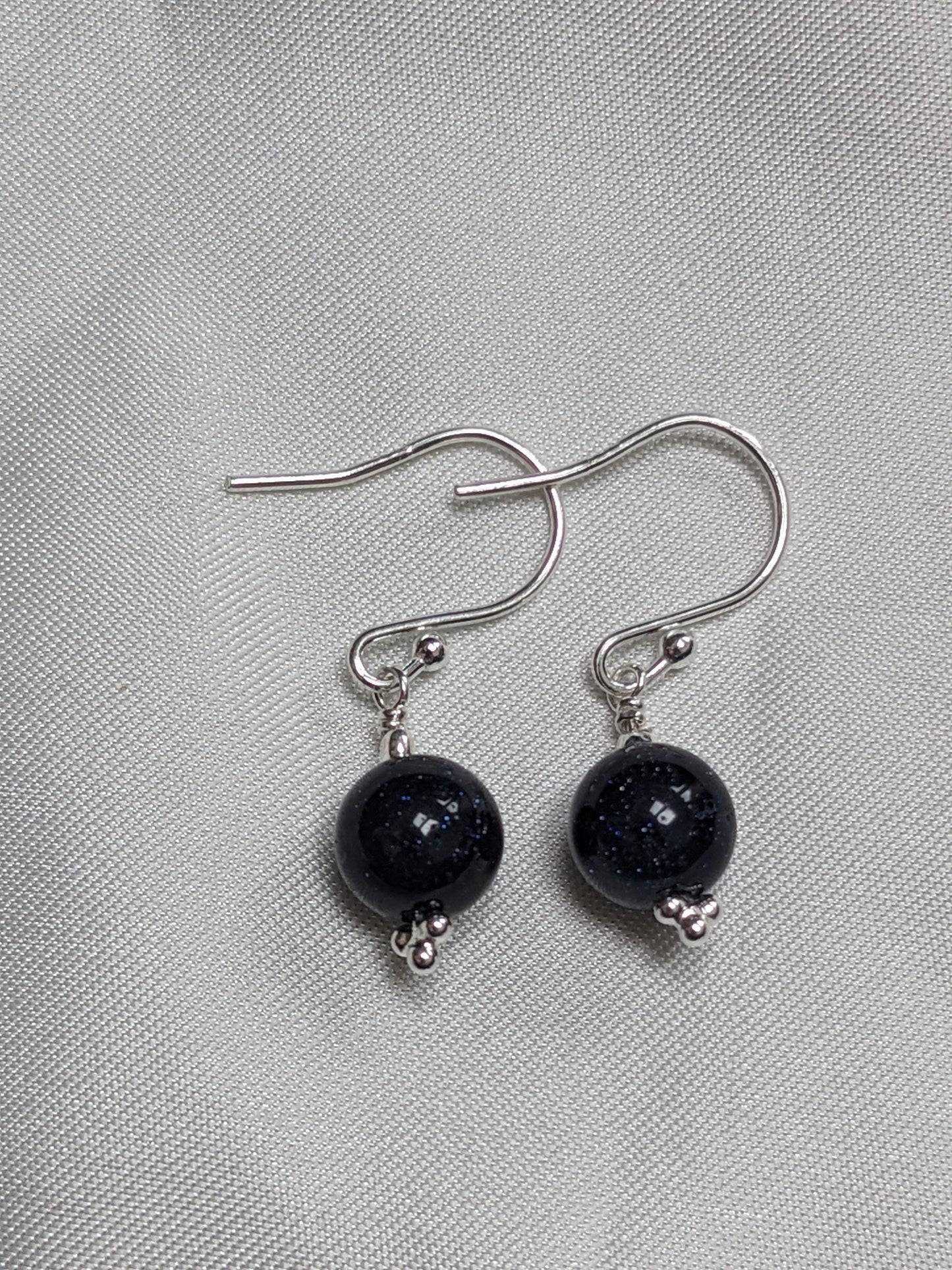Sterling Silver Earrings with a sparkle blue goldstone bead