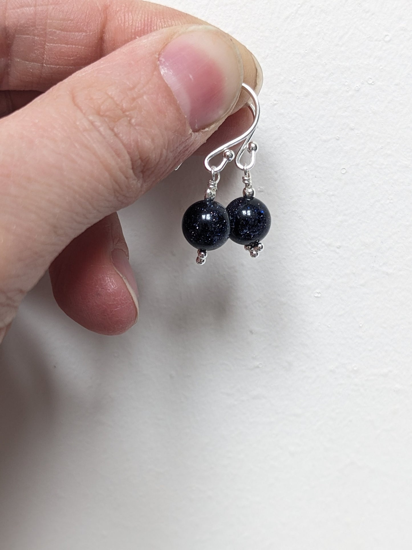 Sterling Silver Earrings with a sparkle blue goldstone bead
