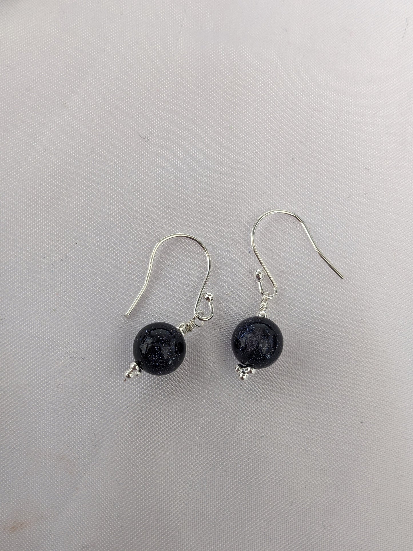 Sterling Silver Earrings with a sparkle blue goldstone bead