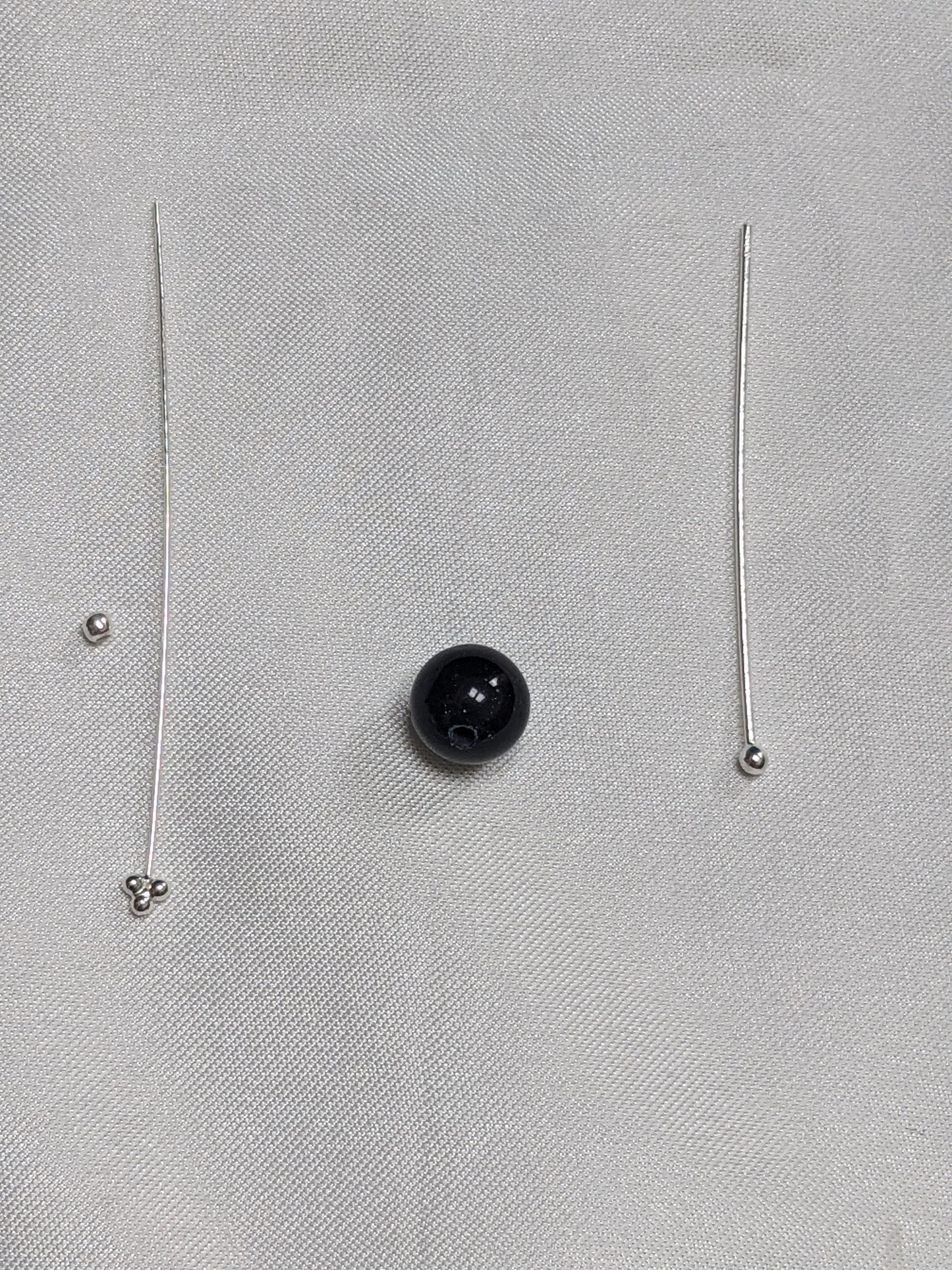 Sterling Silver Earrings with a sparkle blue goldstone bead