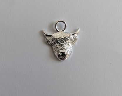 Highland Cow Charm Earrings handmade from fine silver on a small sterling silver hoop or hook